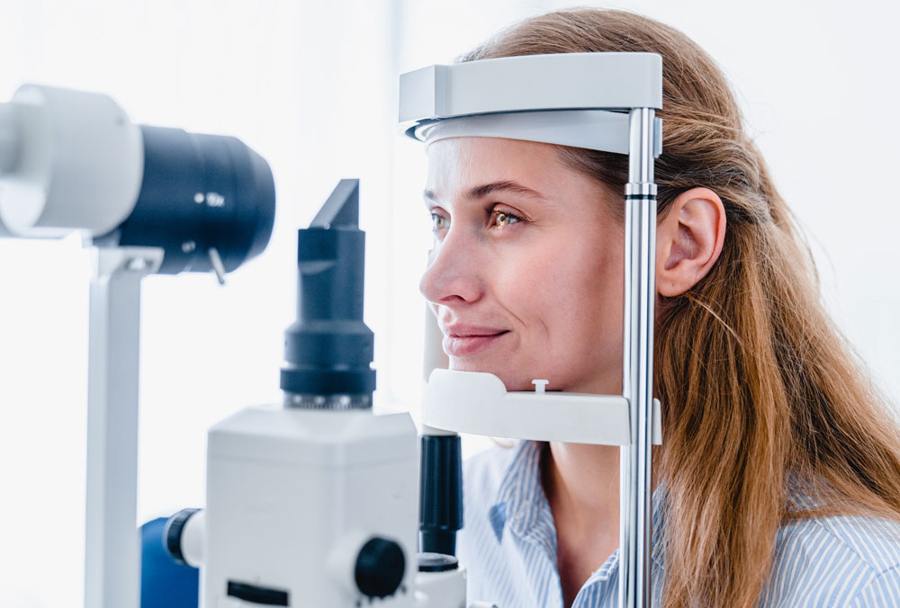 Woman having an eye exam at La Paz Optometric Center