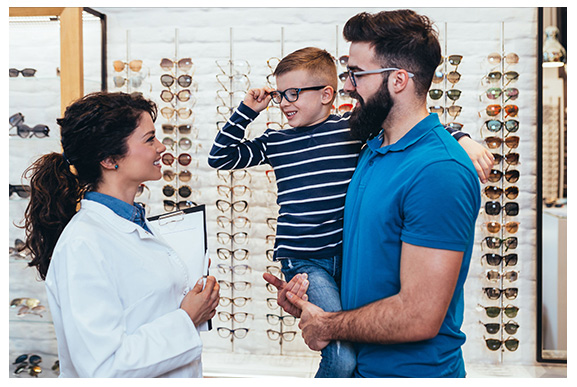 Parent and child choosing an eyewear