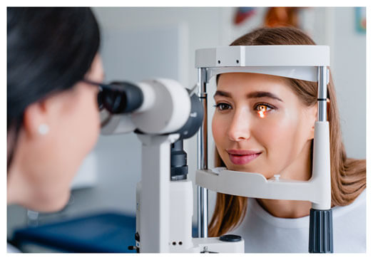 Blonde woman having an eye exam at La Paz Optometric Center